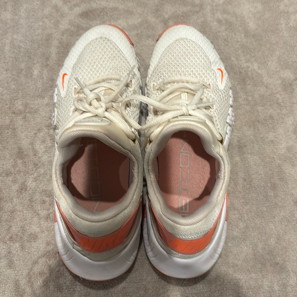 Nike METCON sneakers in white with orange accents. Very gently worn.